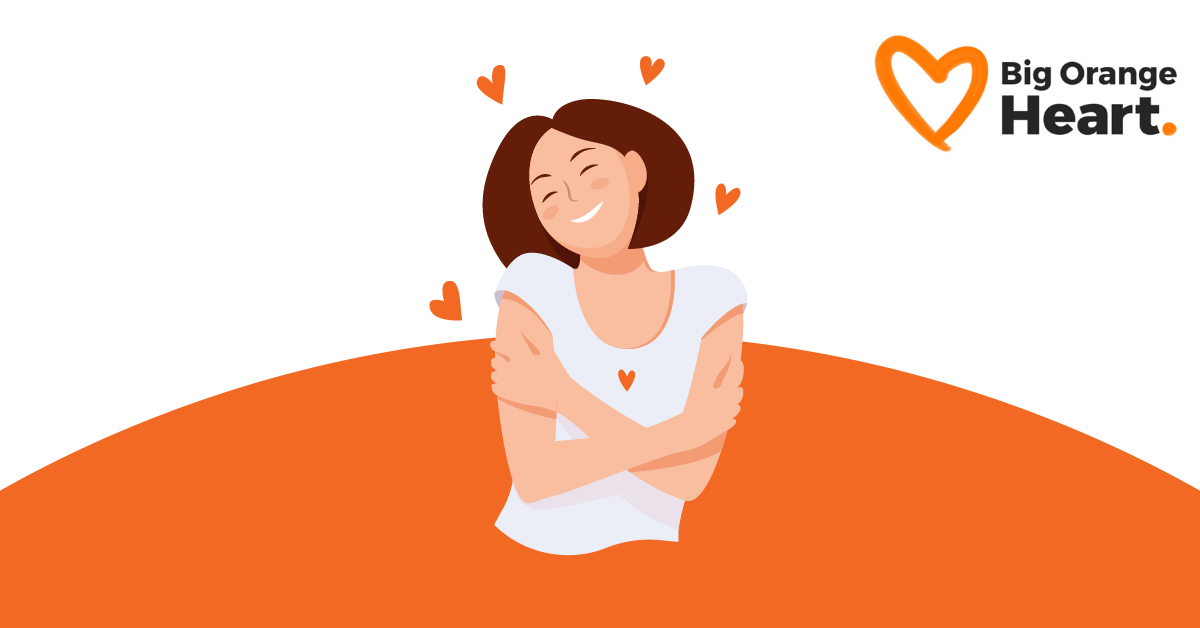 Woman hugging herself with hearts around her